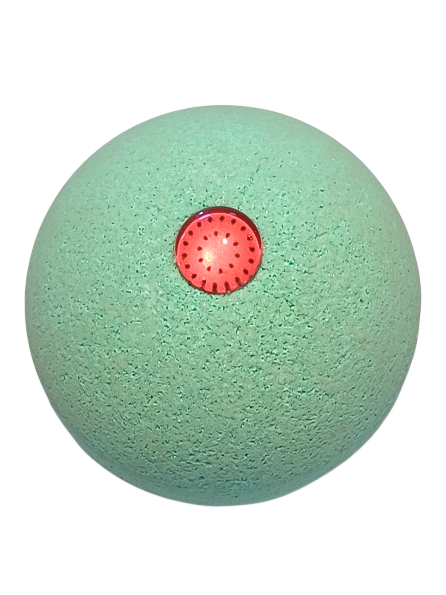 Green bath bomb with a red watermelon on top