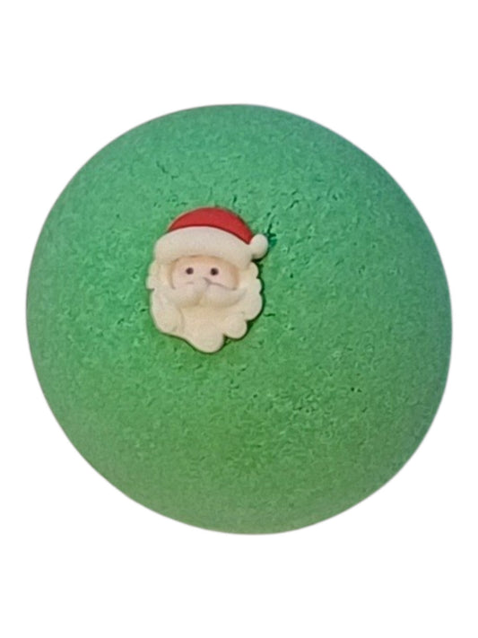 A round green bath bomb featuring a small Santa Claus face decoration on the front, with a Christmas fragrance 