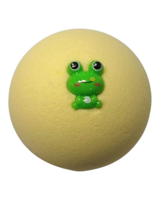 Yellow ball with a green frog figure on top