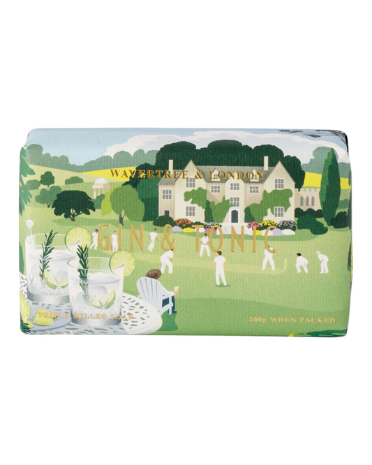 A bar of Wavertree & London soap with an illustration of a cricket match on its packaging, indicating the 'Gin & Tonic' fragrance.