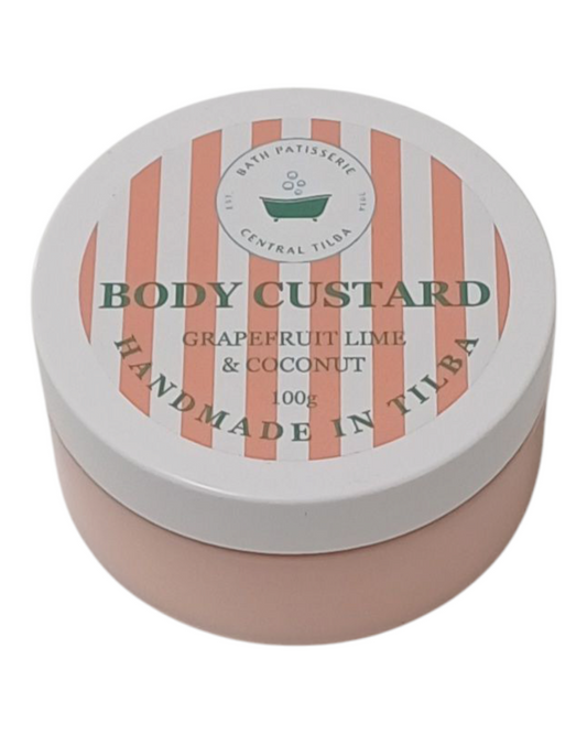 Bath Patisserie Grapefruit, Lime & Coconut Scented Body Custard – orange coloured nourishing custard in labelled jar.
