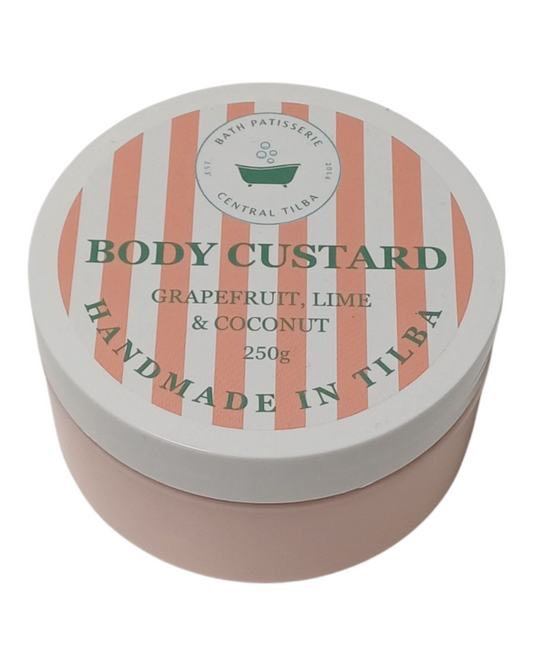 Bath Patisserie Grapefruit, Lime & Coconut Scented Body Custard – orange coloured nourishing custard in labelled jar.