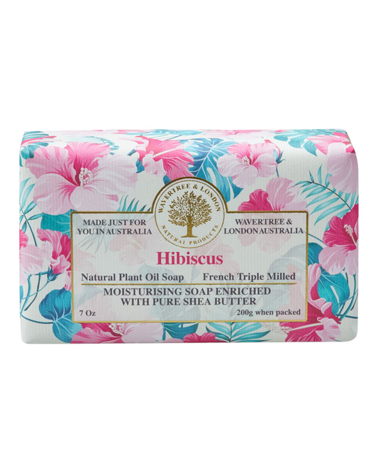 A packaged soap bar with a floral design featuring pink and blue hues, labeled 'Hibiscus'. The brand, Wavertree & London, is indicated on the packaging.