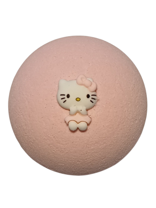Pink colour bath bomb with soft florals and fruits scent, with a cartoon kitty on top