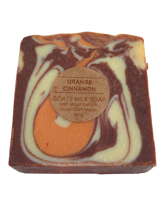 Orange & Cinnamon scented goats milk soap bar with swirl pattern