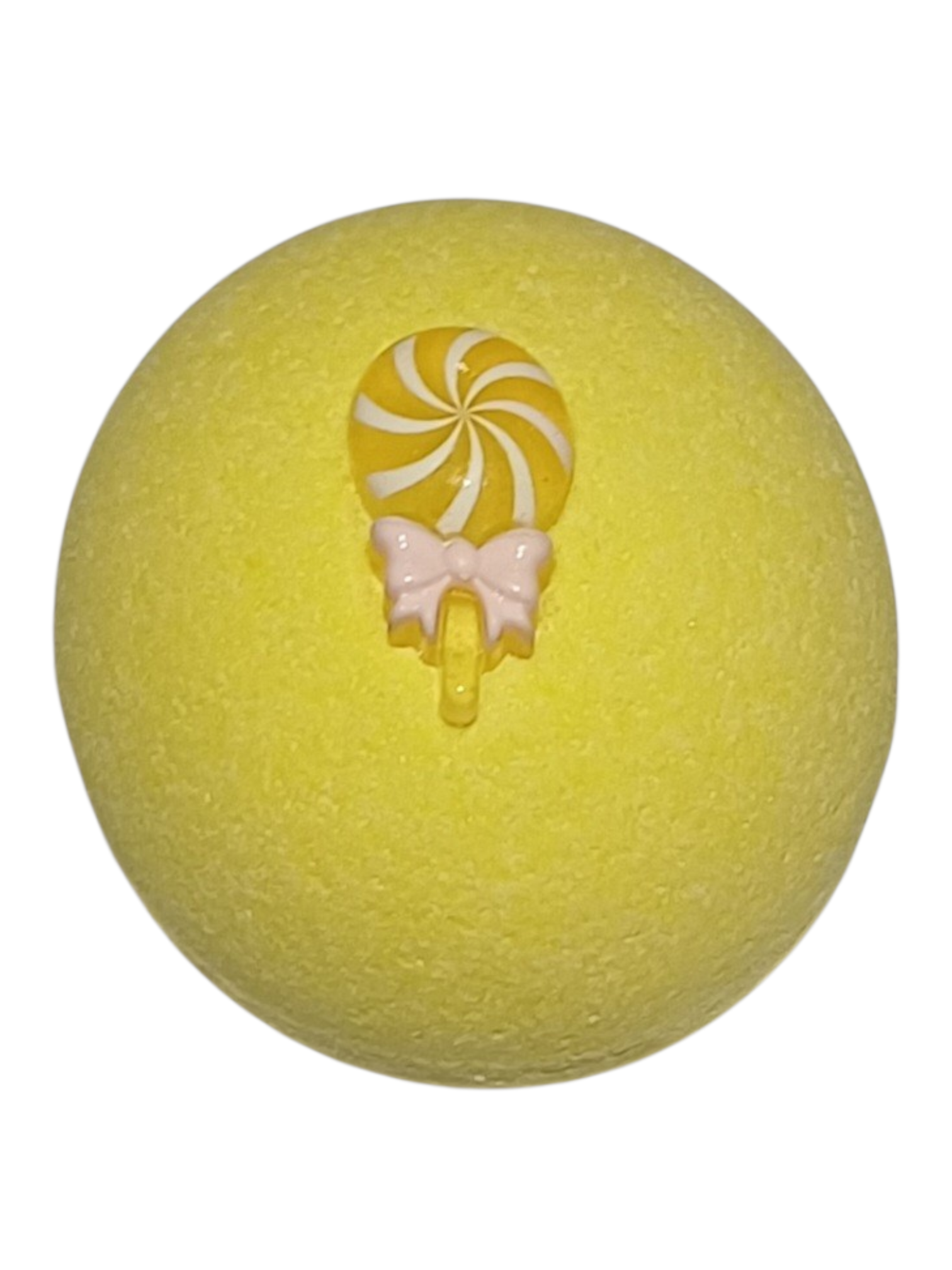 Passionfruit scented yellow bath bomb, with a lolly pop decoration on top