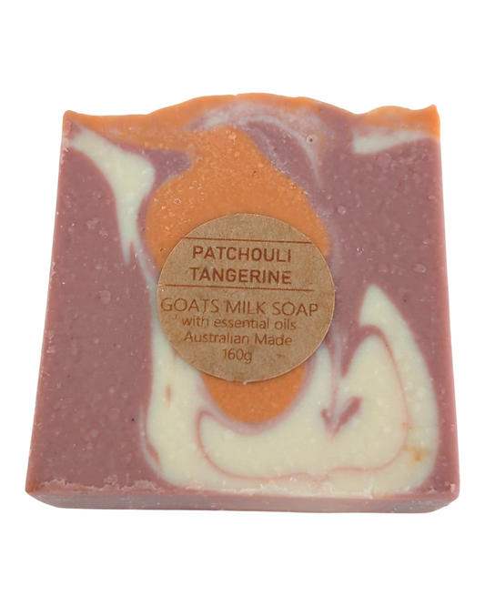 Patchouli & Tangerine scented goats milk soap bar with swirl patten