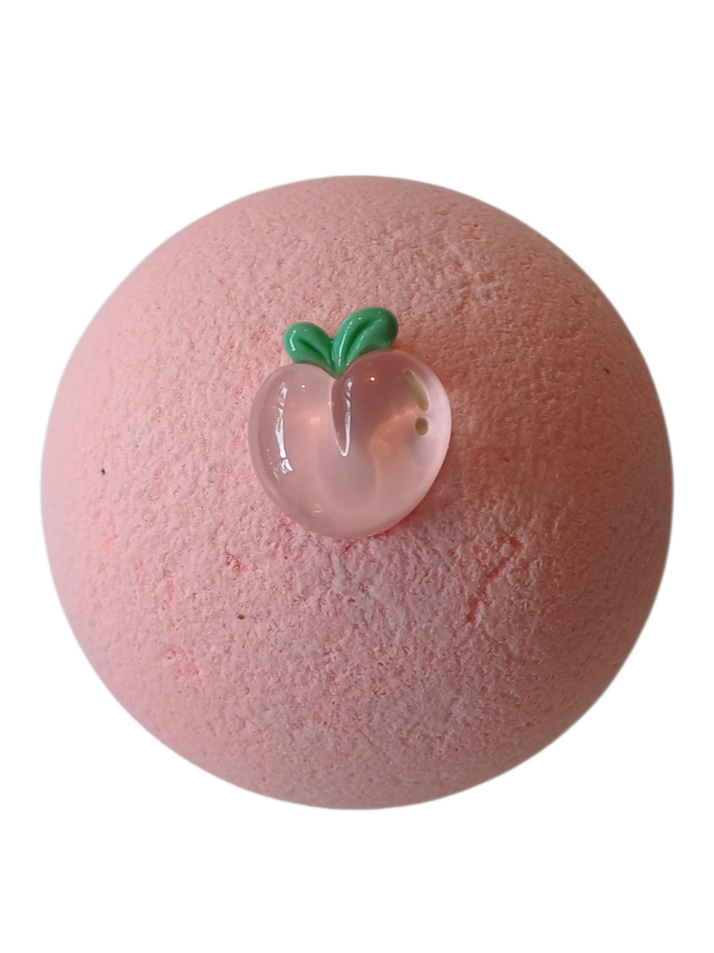 Peach scented bath bomb with a peach-shaped charm